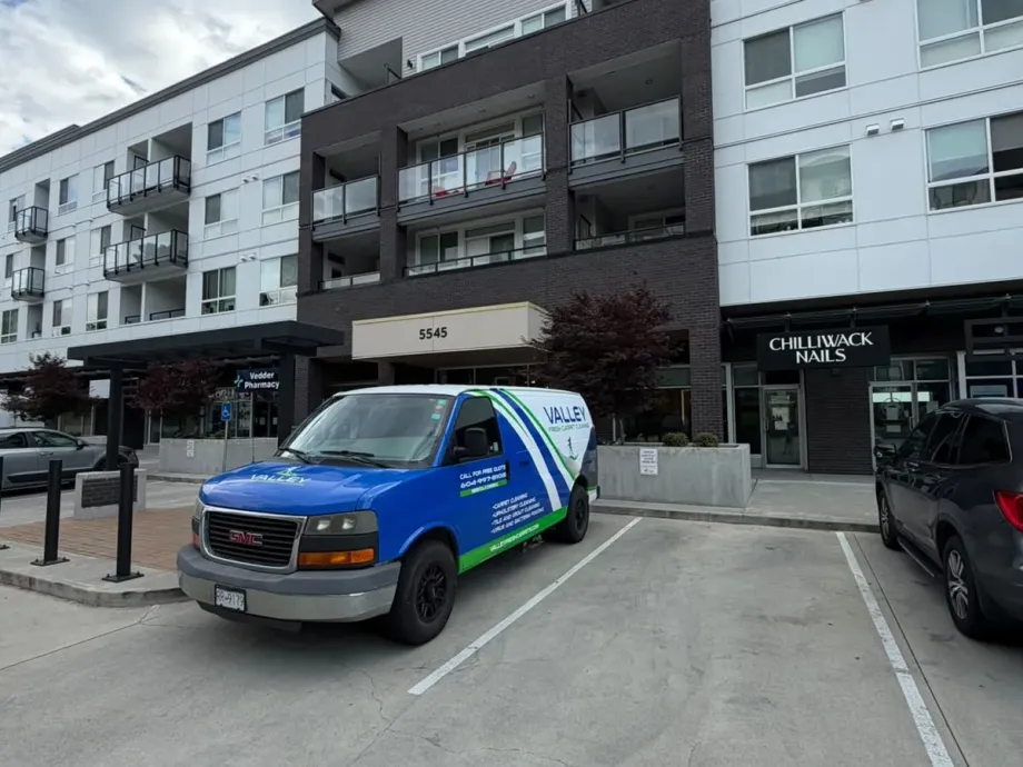Valley Fresh Carpet Cleaning van parked outside McGill Apartments at 5545 Vedder Road in Chilliwack