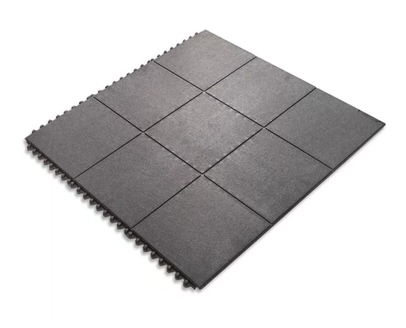 Interlocking foam floor tiles arranged in a grid on a white background.